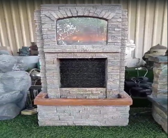Stone-Look Fireplace And Water Fountain